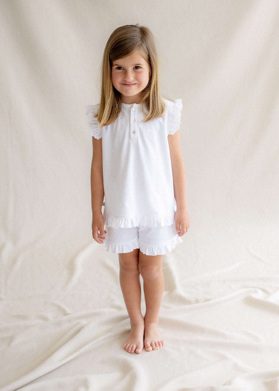 Pyjama enfant à volants et courtes bandes brodées