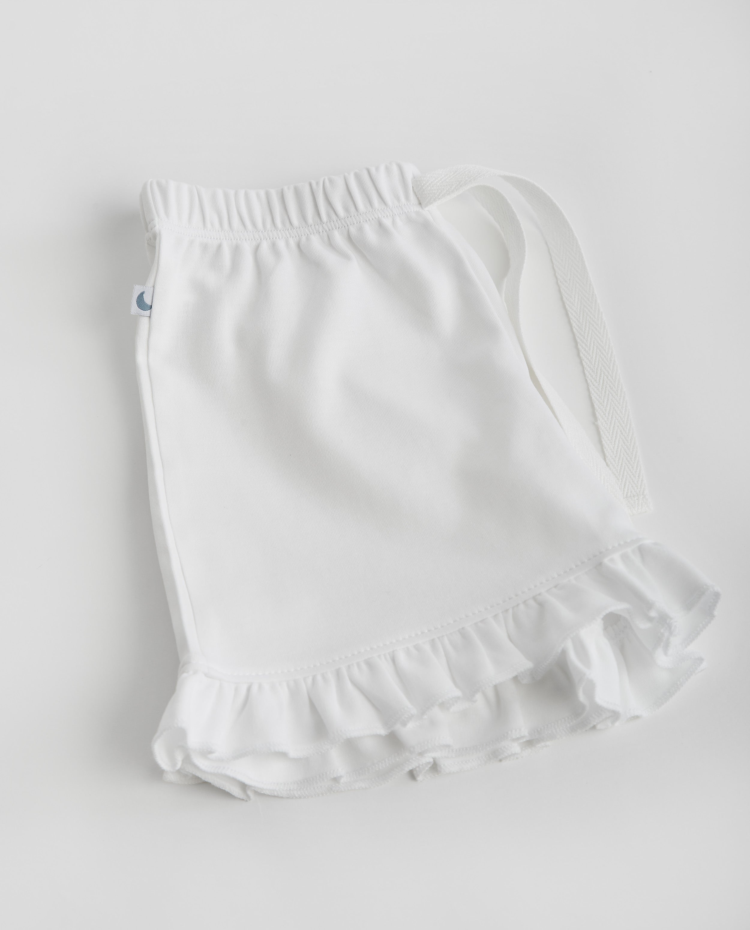 Pyjama enfant à volants et courtes bandes brodées