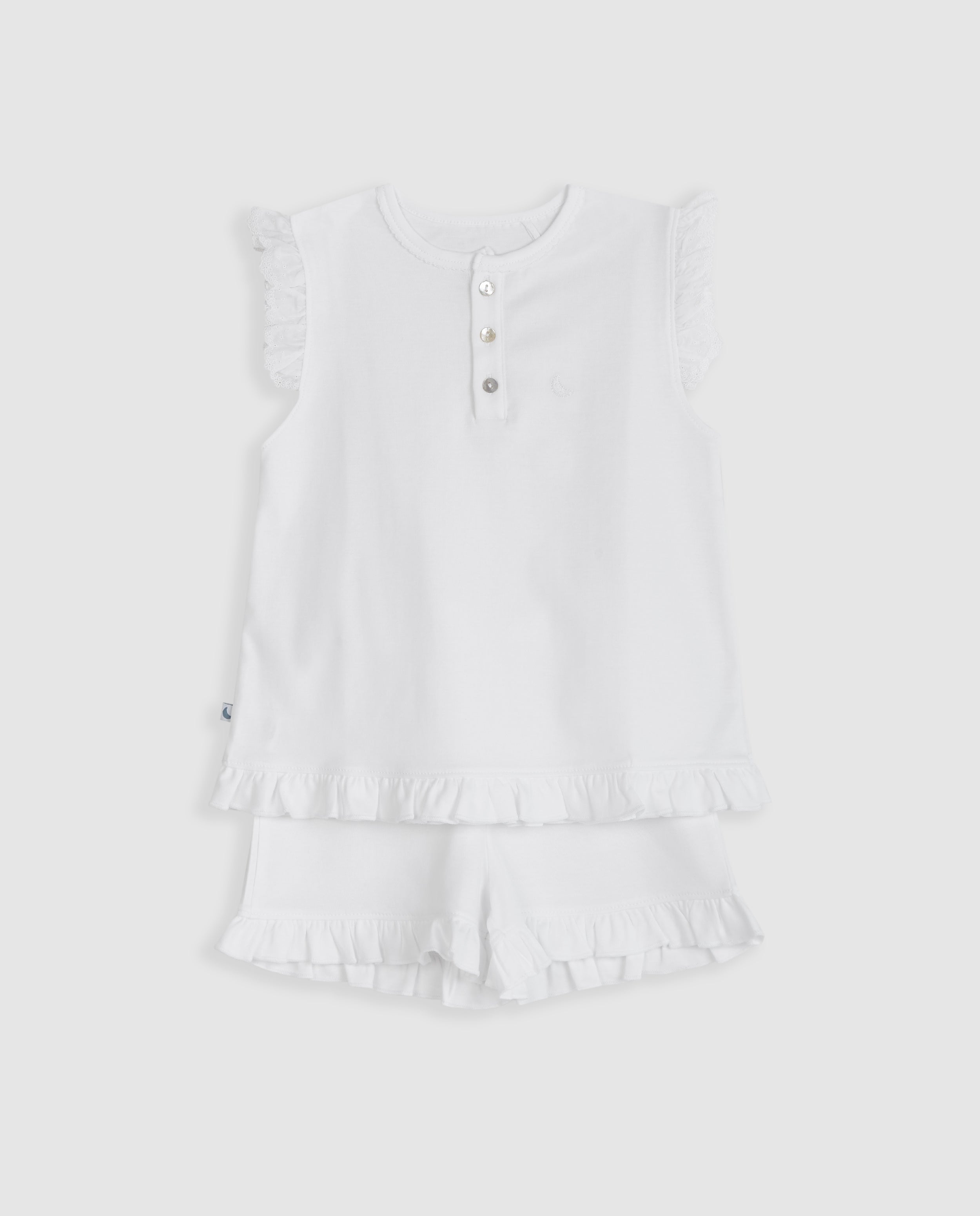 Pyjama enfant à volants et courtes bandes brodées