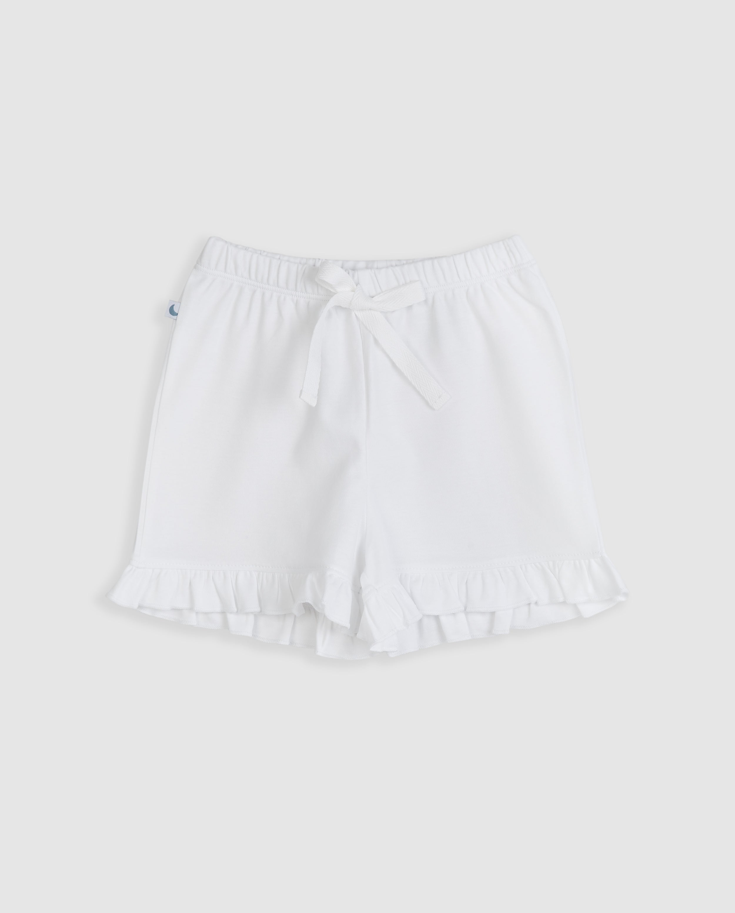 Pyjama enfant à volants et courtes bandes brodées